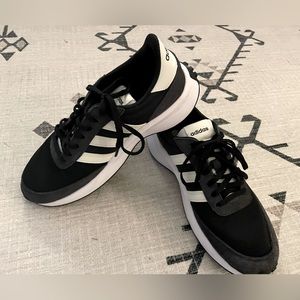 Size 8 woman's adidas shoes worn twice! Great condition just a little too big.